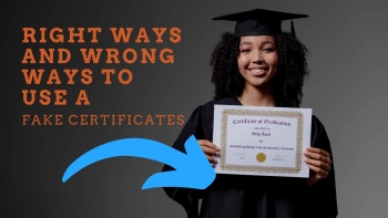 female graduate student in cap and gown holding a copy of her certificate