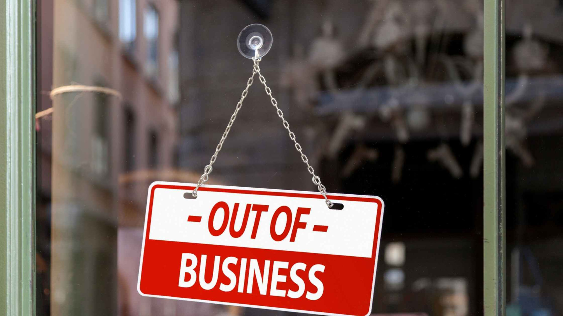 out of business sign in window