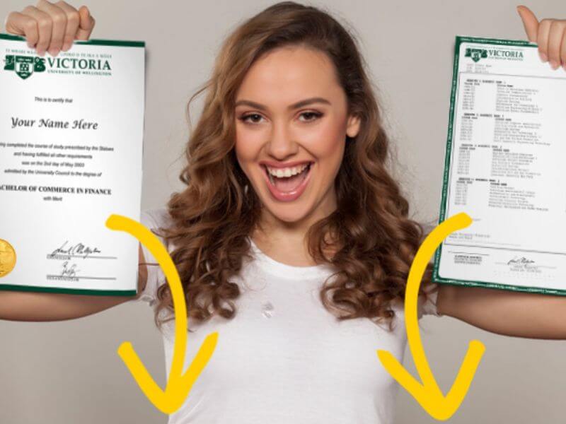 woman holding fake diploma and transcript set in here hands
